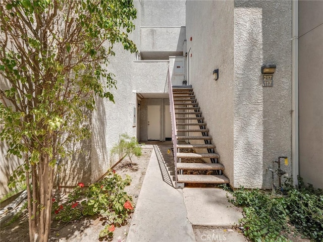 20155 Keswick St Unit 117, Winnetka, CA 91306 - property entrance featuring stucco siding