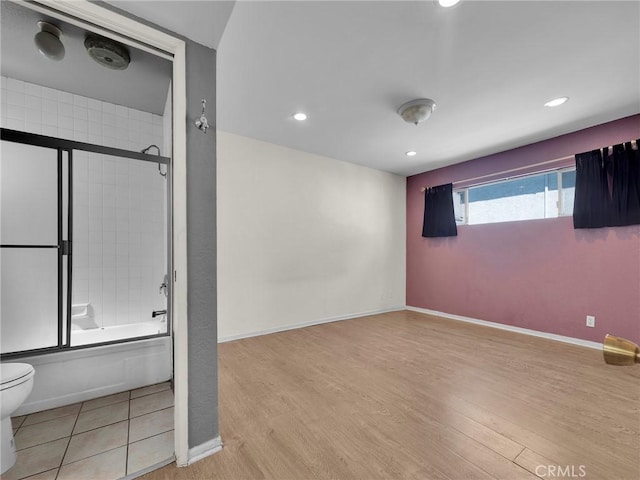 20155 Keswick St Unit 117, Winnetka, CA 91306 - below grade area with wood finished floors, baseboards, and recessed lighting