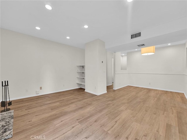 20155 Keswick St Unit 117, Winnetka, CA 91306 - below grade area with light wood-style floors, baseboards, and recessed lighting