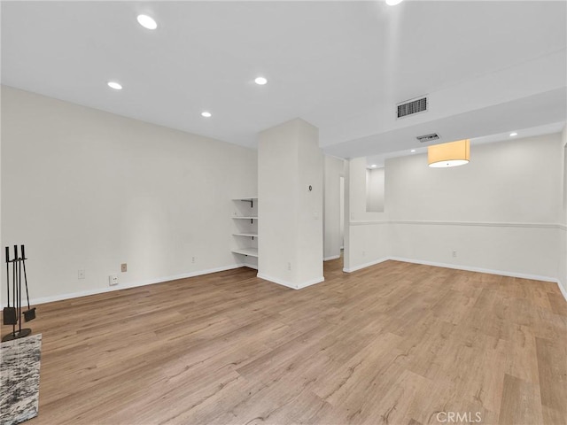20155 Keswick St Unit 117, Winnetka, CA 91306 - basement with light wood finished floors and recessed lighting