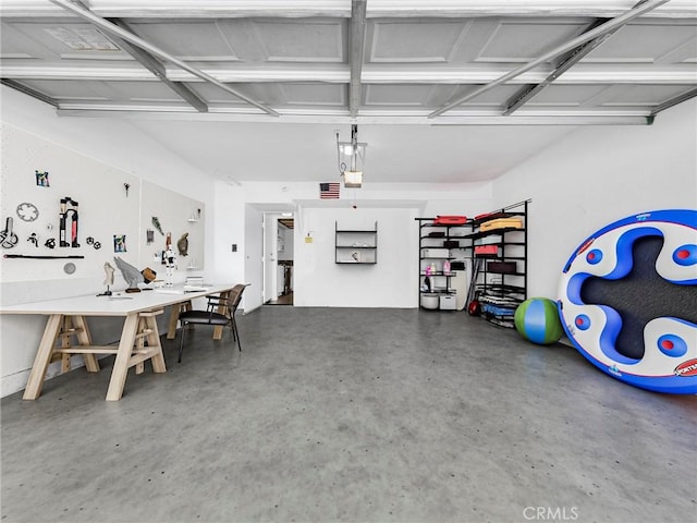 20155 Keswick St Unit 117, Winnetka, CA 91306 - garage featuring a workshop area