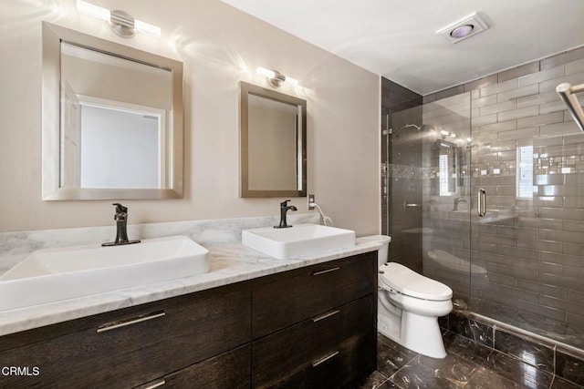 1985 Erin Way, Glendale, CA 91206 - full bath featuring marble finish flooring, toilet, a shower stall, and double vanity