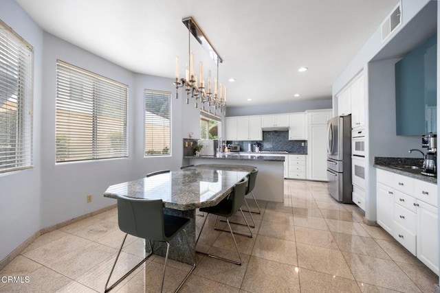 1985 Erin Way, Glendale, CA 91206 - dining space with recessed lighting and baseboards