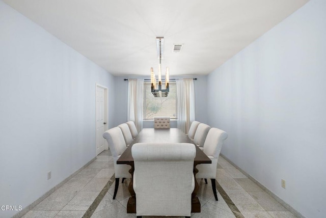 1985 Erin Way, Glendale, CA 91206 - dining area featuring inlaid floor details and a chandelier