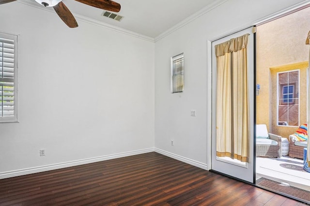 32555 Safflower St, Winchester, CA 92596 - spare room featuring dark wood-type flooring, crown molding, ceiling fan, and baseboards