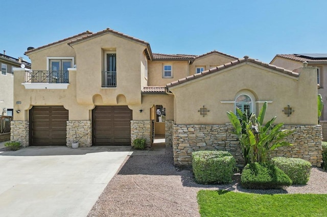 32555 Safflower St, Winchester, CA 92596 - mediterranean / spanish house with a balcony, concrete driveway, stucco siding, and an attached garage