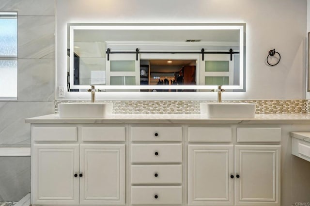32555 Safflower St, Winchester, CA 92596 - bathroom with double vanity and backsplash