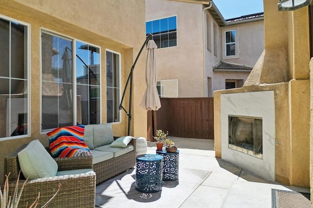 32555 Safflower St, Winchester, CA 92596 - view of patio with an outdoor living space with a fireplace