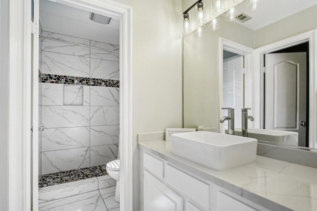32555 Safflower St, Winchester, CA 92596 - full bath with marble finish flooring, toilet, vanity, and a marble finish shower