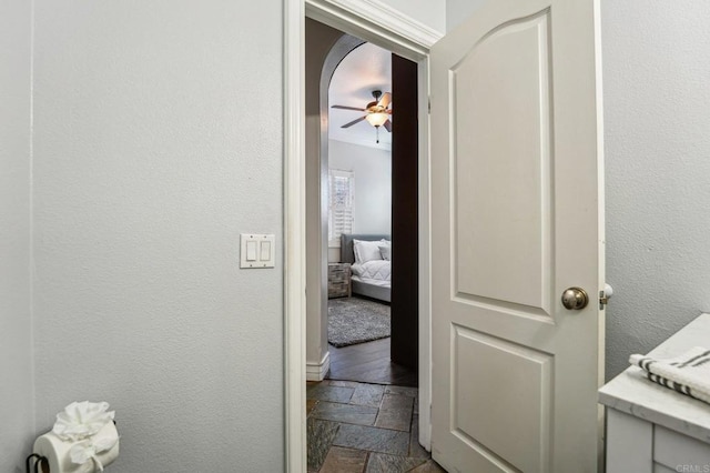 32555 Safflower St, Winchester, CA 92596 - corridor with stone tile flooring and baseboards