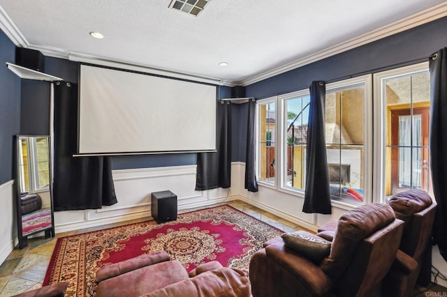 32555 Safflower St, Winchester, CA 92596 - home theater with crown molding, a textured ceiling, recessed lighting, and a wainscoted wall