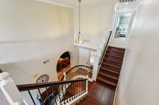 32555 Safflower St, Winchester, CA 92596 - stairway with ornamental molding, wood finished floors, arched walkways, and recessed lighting