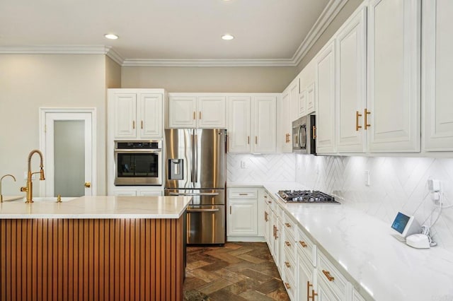 32555 Safflower St, Winchester, CA 92596 - kitchen with stainless steel appliances, a sink, white cabinetry, tasteful backsplash, and light stone countertops