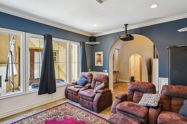 32555 Safflower St, Winchester, CA 92596 - living area featuring arched walkways, ornamental molding, baseboards, and recessed lighting