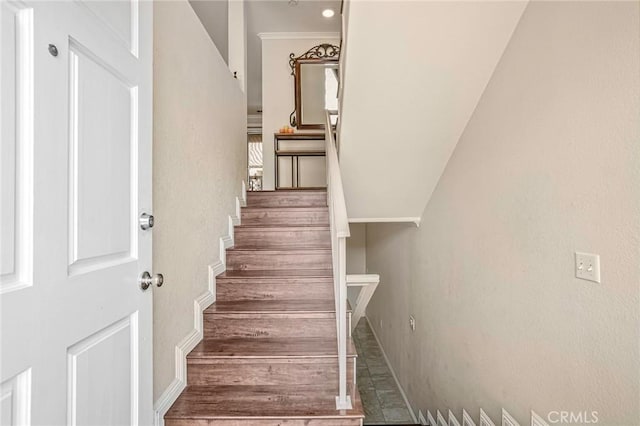 stairs featuring baseboards
