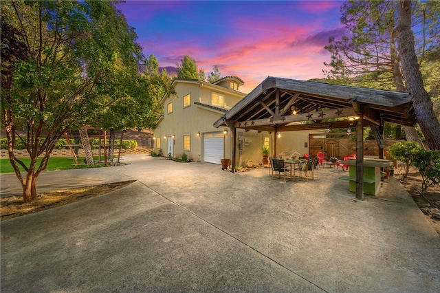 41225 Hacienda Dr, Murrieta, CA 92562 - view of front facade with a gazebo, a garage, concrete driveway, and stucco siding