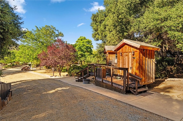 41225 Hacienda Dr, Murrieta, CA 92562 - view of outbuilding featuring view of wooded area
