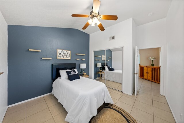 41225 Hacienda Dr, Murrieta, CA 92562 - bedroom featuring light tile patterned floors, lofted ceiling, baseboards, and ceiling fan