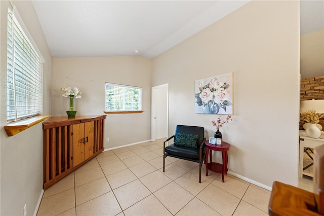 41225 Hacienda Dr, Murrieta, CA 92562 - living area featuring vaulted ceiling, baseboards, and light tile patterned floors