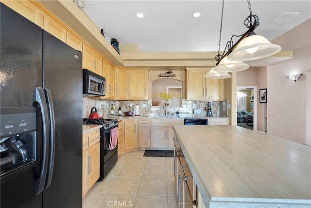 kitchen with black appliances, light brown cabinets, light countertops, tasteful backsplash, and recessed lighting