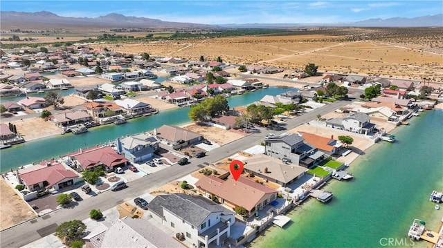 aerial perspective of suburban area with mountains