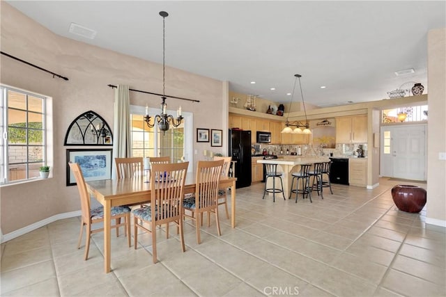 dining space featuring a chandelier, light tile patterned floors, baseboards, and recessed lighting