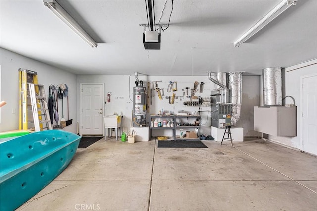 garage featuring water heater, a garage door opener, heating unit, a sink, and a workshop area