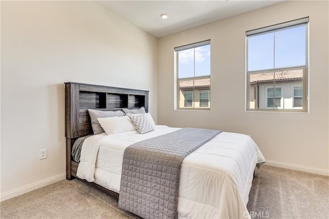 1648 Fig Tree Way, Oceanside, CA 92056 - carpeted bedroom featuring baseboards