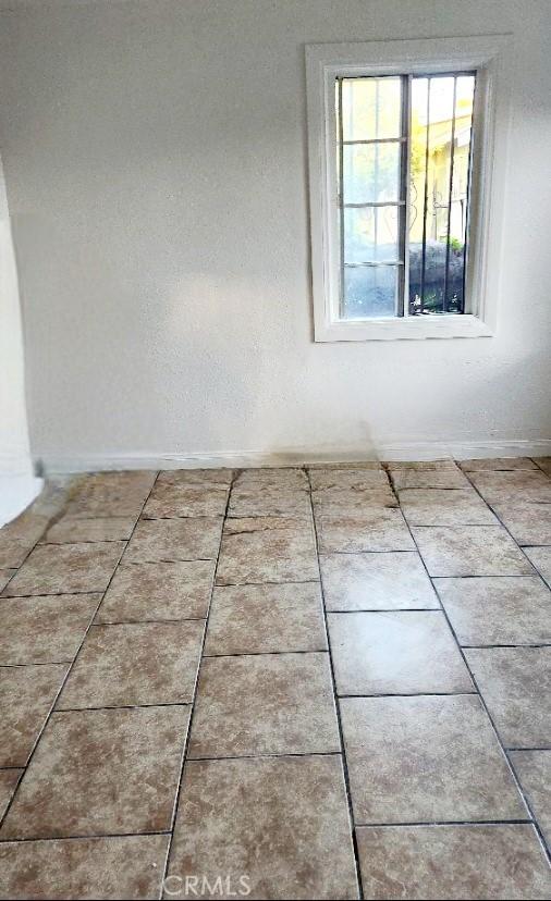 2305 Walter St, Huntington Park, CA 90255 - empty room featuring baseboards