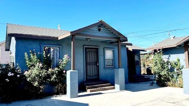 2305 Walter St, Huntington Park, CA 90255 - view of front of home featuring stucco siding