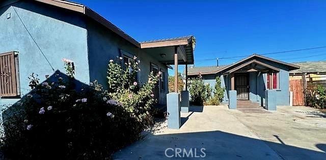 2305 Walter St, Huntington Park, CA 90255 - view of side of home with stucco siding