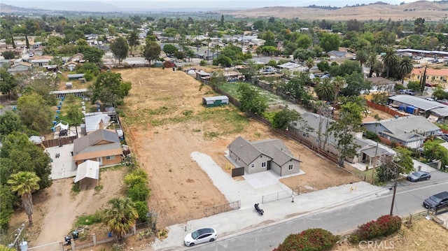 aerial view of residential area with a mountainous background