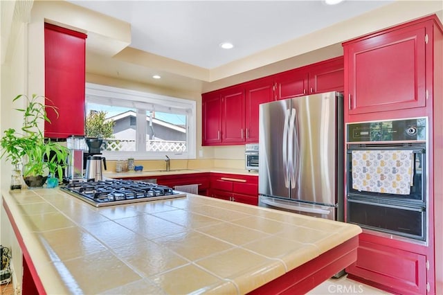 1961 W 187th Pl, Torrance, CA 90504 - kitchen featuring stainless steel appliances, a warming drawer, recessed lighting, a sink, and a peninsula