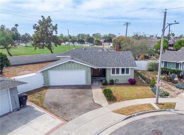 1961 W 187th Pl, Torrance, CA 90504 - single story home with roof with shingles, driveway, board and batten siding, a garage, and a chimney