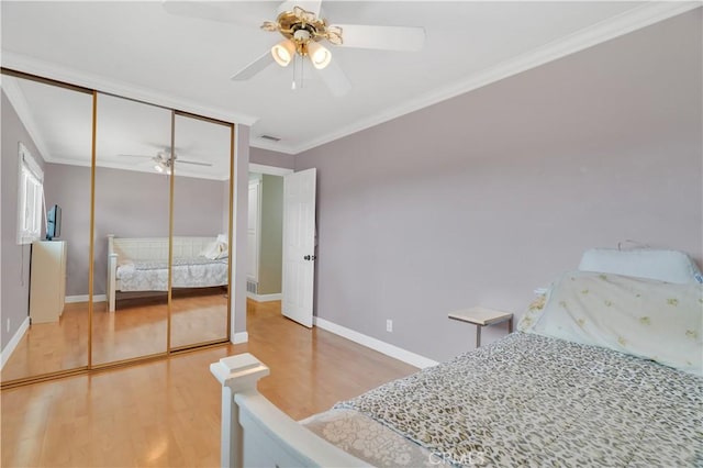 1961 W 187th Pl, Torrance, CA 90504 - bedroom with light wood-type flooring, crown molding, baseboards, a ceiling fan, and a closet