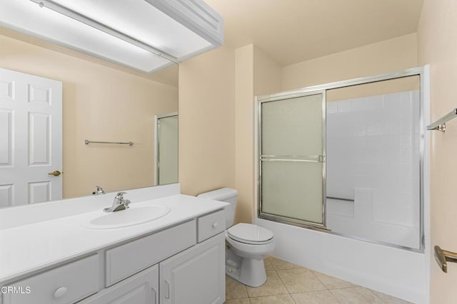 2451 Manet Ln, Simi Valley, CA 93063 - full bathroom with tile patterned flooring, toilet, vanity, and bath / shower combo with glass door