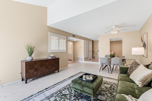2451 Manet Ln, Simi Valley, CA 93063 - tiled living room featuring a ceiling fan and baseboards
