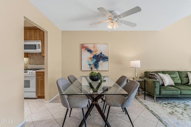 2451 Manet Ln, Simi Valley, CA 93063 - dining space featuring light tile patterned floors and a ceiling fan