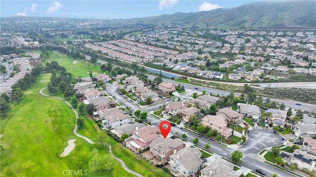 34113 Castle Pines Dr, Yucaipa, CA 92399 - aerial view of property and surrounding area featuring nearby suburban area, a mountainous background, and a golf club