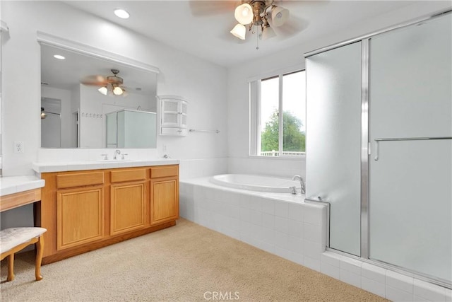 34113 Castle Pines Dr, Yucaipa, CA 92399 - bathroom featuring ceiling fan, carpet floors, an enclosed shower, a garden tub, and recessed lighting