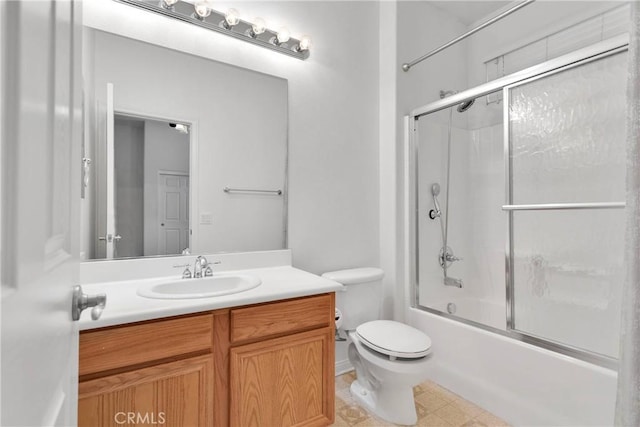 34113 Castle Pines Dr, Yucaipa, CA 92399 - full bathroom featuring combined bath / shower with glass door, toilet, vanity, and tile patterned floors