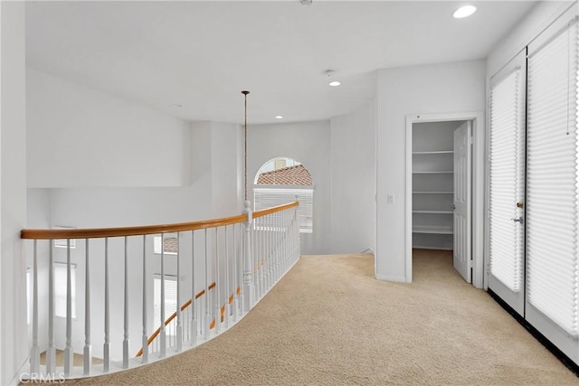 34113 Castle Pines Dr, Yucaipa, CA 92399 - corridor with carpet floors, an upstairs landing, and recessed lighting