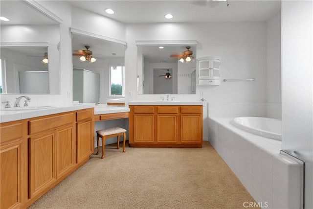 34113 Castle Pines Dr, Yucaipa, CA 92399 - bathroom featuring ceiling fan, carpet, a bath, a shower with shower door, and vanity