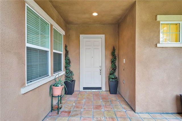 34113 Castle Pines Dr, Yucaipa, CA 92399 - view of exterior entry with stucco siding
