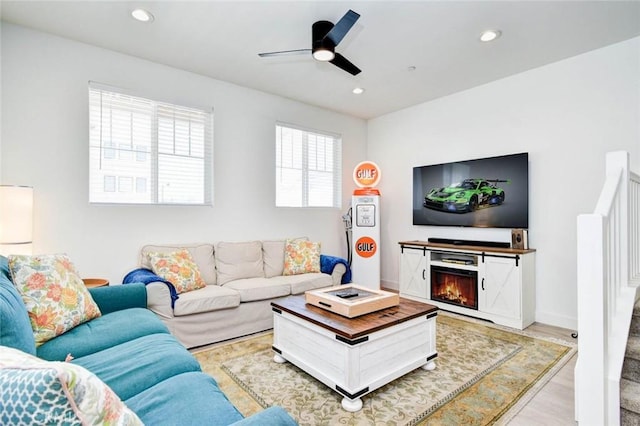 1053 Tiburon Way, San Luis Obispo, CA 93401 - living room with a ceiling fan, recessed lighting, light wood finished floors, and a lit fireplace
