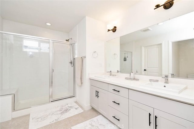 1053 Tiburon Way, San Luis Obispo, CA 93401 - bathroom with a stall shower, double vanity, marble finish floors, recessed lighting, and baseboards