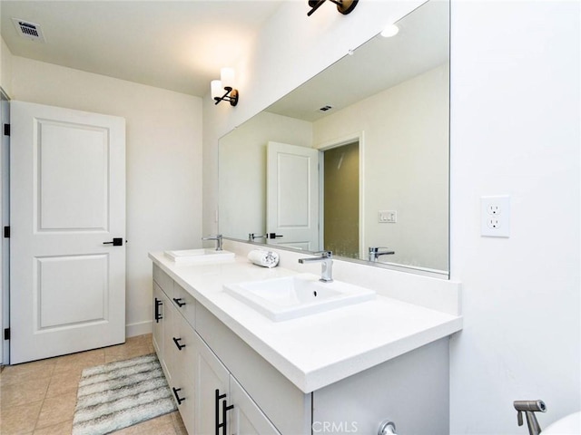 1053 Tiburon Way, San Luis Obispo, CA 93401 - bathroom with double vanity, tile patterned floors, and baseboards