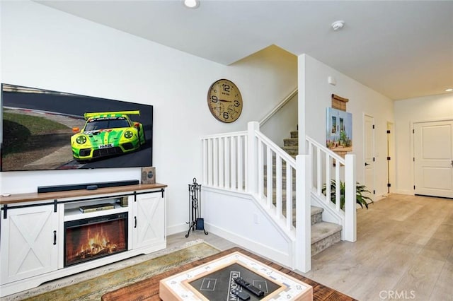 1053 Tiburon Way, San Luis Obispo, CA 93401 - living area featuring stairway, light wood finished floors, recessed lighting, and baseboards