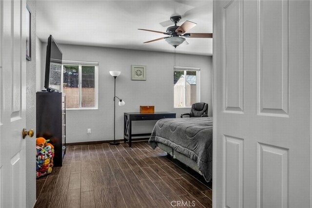 1729 Amelia Ave, San Pedro, CA 90731 - bedroom with multiple windows, dark wood-style floors, baseboards, and ceiling fan