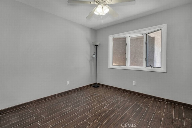 1729 Amelia Ave, San Pedro, CA 90731 - spare room featuring dark wood-type flooring, a ceiling fan, and baseboards
